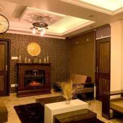 Uptown Boutique Home - 2BHK with drive-in