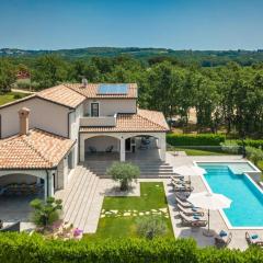 Family villa Maria with pool in Vizinada