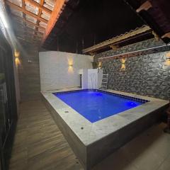 Casa com piscina em praia grande piscina aquecida