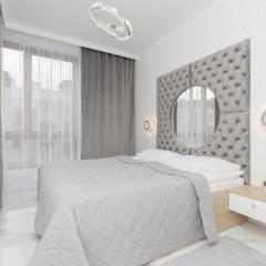 Warsaw Sarmacka Apartment with Gym, Sauna and Parking by Noclegi Renters