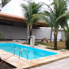 Piscina 6 QUARTO 300m PRAIA jardim churrasqueira 16 PESSOAS garagem 3 carros Monitoramento 24 horas Mesa de sinuca