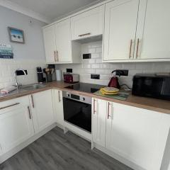 246, Belle Aire, Hemsby - Two bed recently renovated chalet, sleeps 5, free Wi-Fi, pet friendly, bed linen and towels included with onsite entertainment