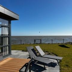 Enkhuizer Strand Chalet Meeresrauschen Erste Reihe mit Zaun Haus Nr 249