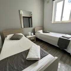 F9-2 Room 2 single beds shared bathroom in shared Flat