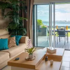 RÉF 231 - PORT-LOUIS appartement type 2 pleine vue Petite Mer avec terrasse, parking et garage dans résidence récente