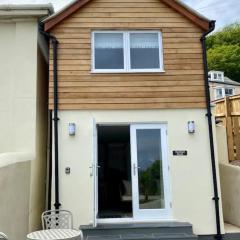 Stunning little house, 2 mins from Lyme Regis beach with a sea view to die for. Sleeps 2, free parking, small dog welcome.