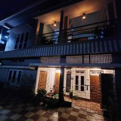 Bela's Homestay, AC Rooms with Kitchen and dining area