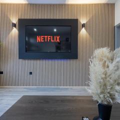 Deluxe Bolton Cinema House 2BR Modern Retreat with Free Parking