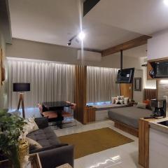 Lindo studio na área central de Poços