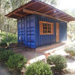 Container em Ouro Preto: represa mata caiaque bike