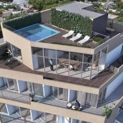 Sofisticado Penthouse a estrenar en Sofisticado Barrio y Edificio Vista panorámica 100m2 Gimnasio Piscina Lujoso Salon de Fiestas Parking privado con acceso directo al departamento