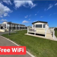 Buttercup Meadow Golden Anchor park, Chapel St. Leonard, modern 6 berth caravan, dog friendly, WiFi