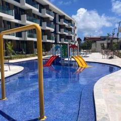 Resort em Porto de Galinhas- Flat Térreo Frente Piscinas- Muro Alto-B18