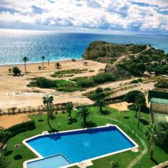 Top-Floor Beachfront Apartment with Parking, Pool, & Spacious Sea-View Balcony