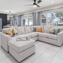 Paradise in Blue is a 5BR Contemporary Modern Screened in Heated Pool Home that Sleeps 12 in Temple Terrace Neighborhood near Busch Gardens & USF
