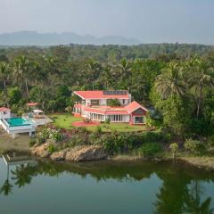 StayVista's Waterway Retreat - Lakeside Oasis with Infinity Pool