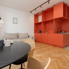 Comfortable and Modern Orange Studio in Warsaw by Renters