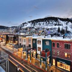 Contemporary Custom Condo Paired with the Best Location in the Center of Main Street. Walk to Ski.