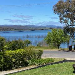 Relax in the spa with views opposite Lake Eildon