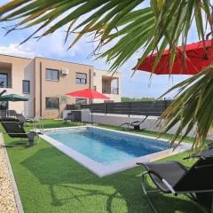 Villa Tri Palme with heated pool