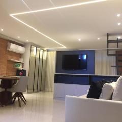 Flat novo e estiloso na praia Ponta de Campina