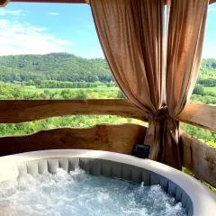 Holiday home with hot tube, near the river
