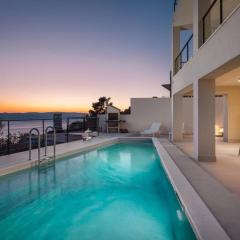 Modern Villa Maris - with heated pool & sea view