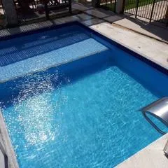 Flat aconchegante a uma quadra da praia