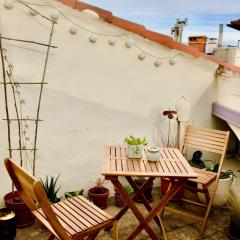 Joli studio avec terrasse-jardin sur les toits, coeur historique