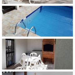 500M DA PRAIA, Prédio cm Piscina, 1Garagem, WI-FI 300 Mbps, Centro de Guarujá, próximo à Praia e Comércio, horários check-in e check-out flexíveis, churrasqueira,