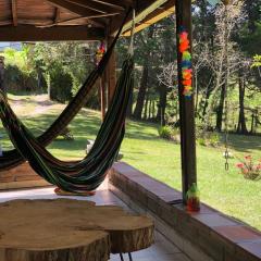 Casa Rustica con chimenea en su interior, rodeado de los cuatro elementos tierra, fuego, aire y agua, ubicada en sector tranquilo, para descansar en familia o amigos,