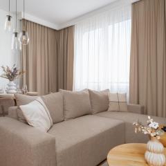 Stylish Beige Apartment with One Bedroom and Parking in Poznań by Renters
