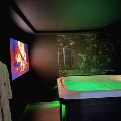 Suite romantique avec jacuzzi et sauna