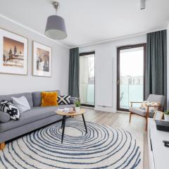 Subtle Grey Apartment with Furnished Balcony and Parking in Kraków by Renters