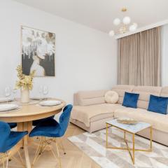 Bright Beige Apartment with Furnished Balcony and Parking in Gdańsk by Noclegi Renters