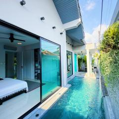 Stylish 3br Villa walk to beautiful beach shared pool