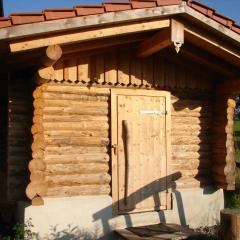 Blockhaus im Permakulturgarten