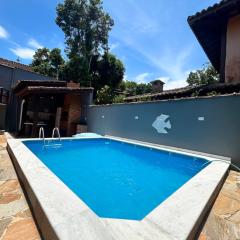 Casa com piscina em Barra do Una