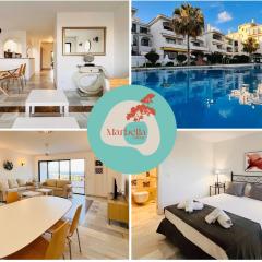 Renovated Apartment with Sea Views and Pool with Private Parking