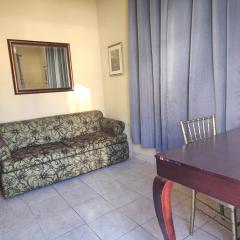 Del Valle Central Casa near Trendy Calle Loiza- One bedroom with queen