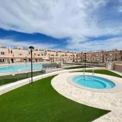 Apartment with private, heated jacuzzi, AC, pool