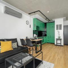 Black and Green Apartment with 2 FREE PARKING Places and Balcony in Poznań by Renters