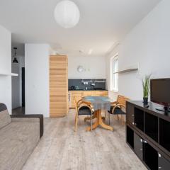 Krzyżówki Comfort Apartment by BookingHost
