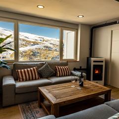 Luxury refurnished apartment with Private Parking close to ski slopes