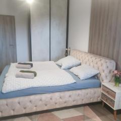 Beli Apartman Mélygarázzsal
