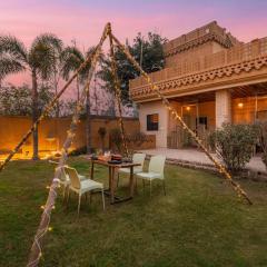 StayVista's Chahal Farmstay - Lake & Farm-View Villa with Terrace, Lawn featuring a Gazebo & Indoor-Outdoor Games
