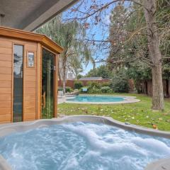 Home oasis with sauna, jacuzzi, pool & heated gazebo!