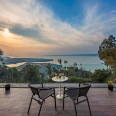 StayVista's Lake Pearl Serenity - Riverside, Mountain-View Villa with Jacuzzi, Sprawling Lawn & Terrace