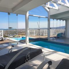 'The Bolussi Beachhouse', sleeps 12 in 6 en-suite bedrooms with Indoor Pool