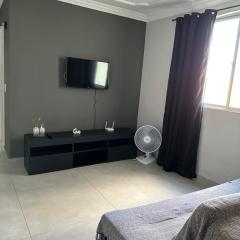 Apartamento novo ao lado do Rio Centro!